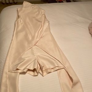 This is a head turner Winter white dress romper